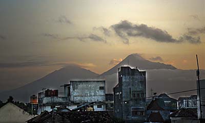 Mount Merapi and Mount Merbabu, seen from Yogyakarta by Asienreisender